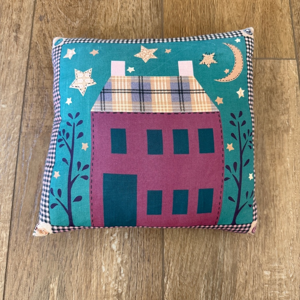 Decorative Cute pillow with a whimsical house design